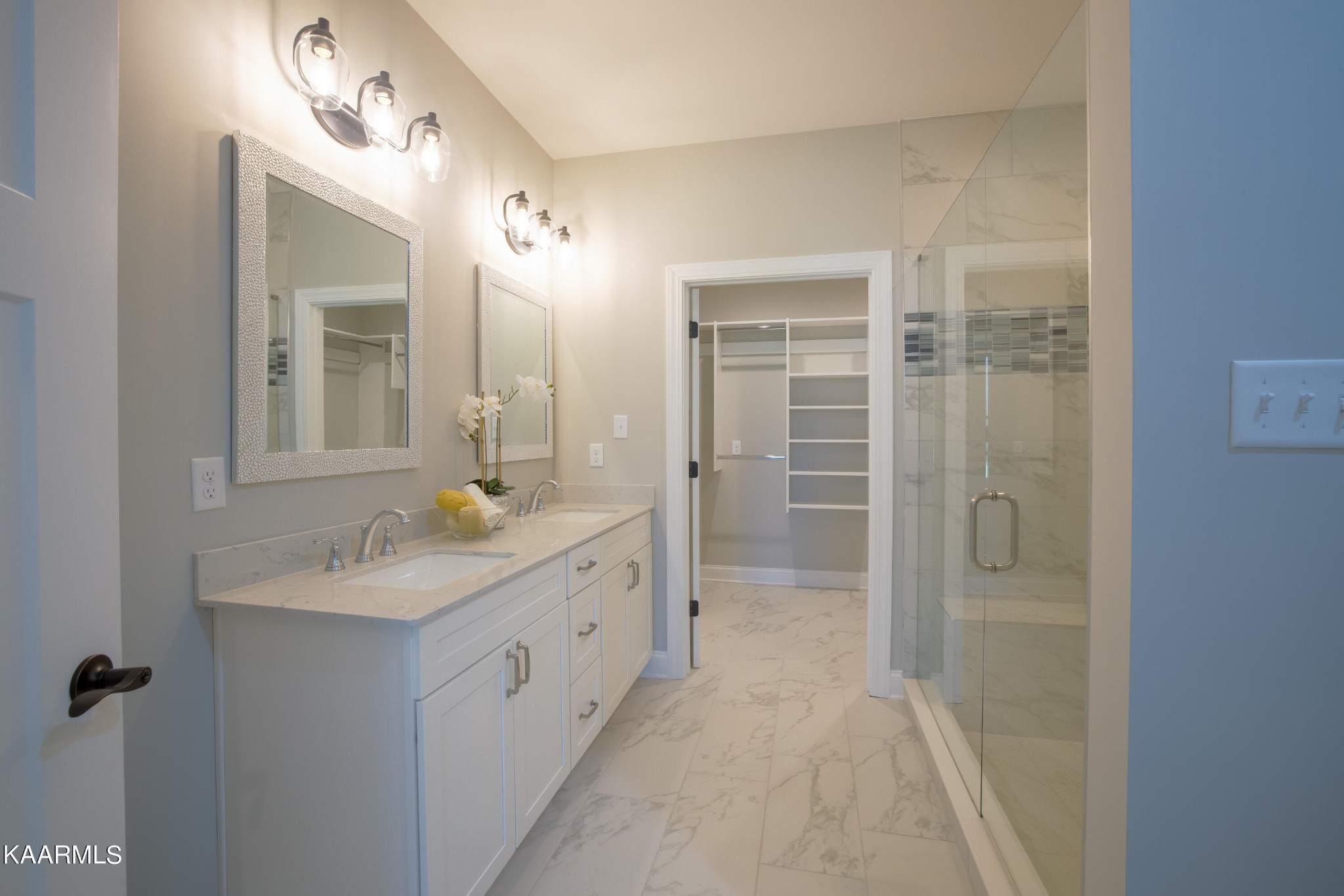 162 Tsuhdatsi Way Loudon, TN 37774 - Photo 22 of 38 a bathroom with a shower sink and mirror