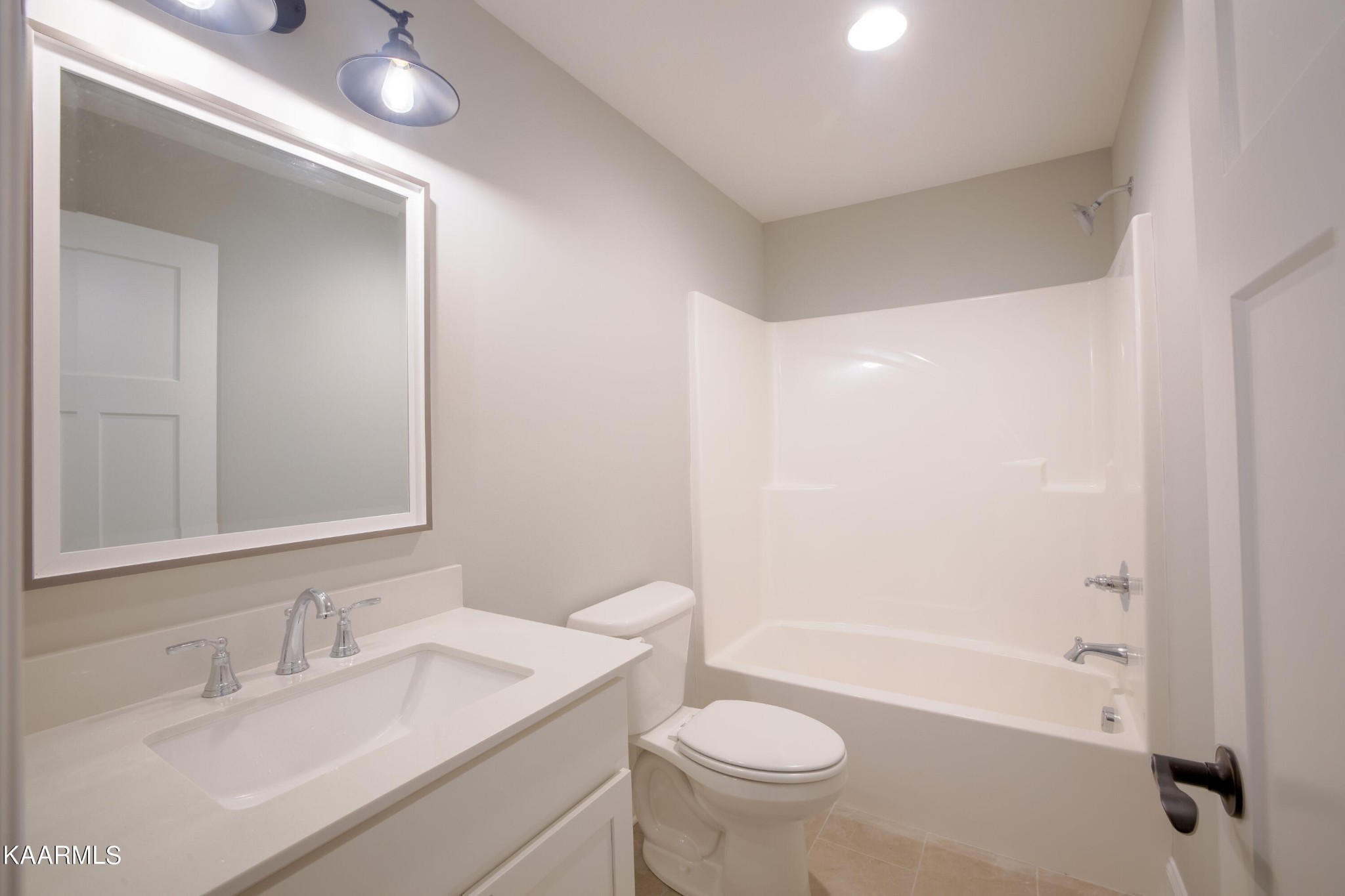 162 Tsuhdatsi Way Loudon, TN 37774 - Photo 28 of 38 a bathroom with a sink a toilet and shower