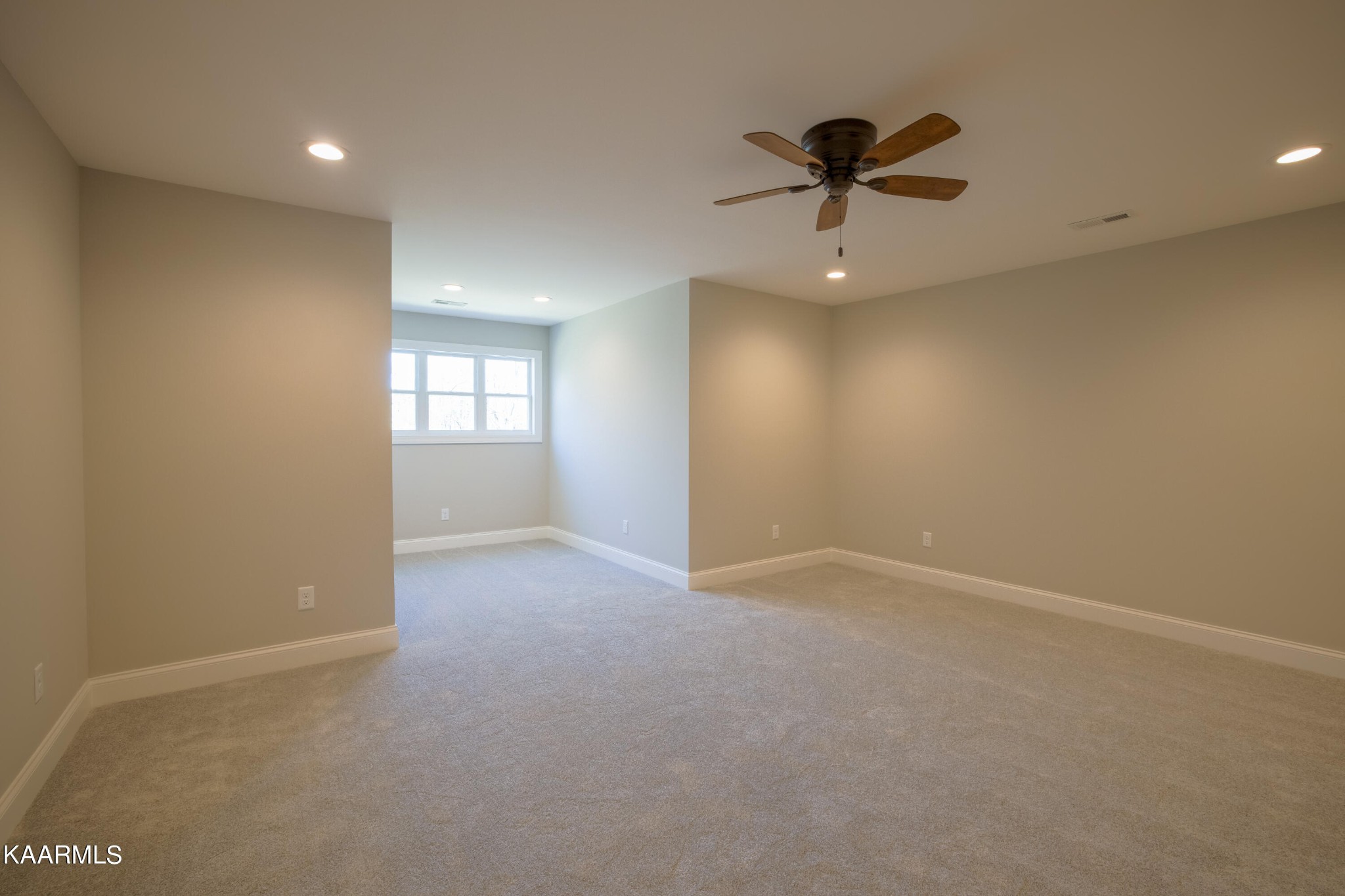 162 Tsuhdatsi Way Loudon, TN 37774 - Photo 34 of 38 wooden floor in an empty room with a window