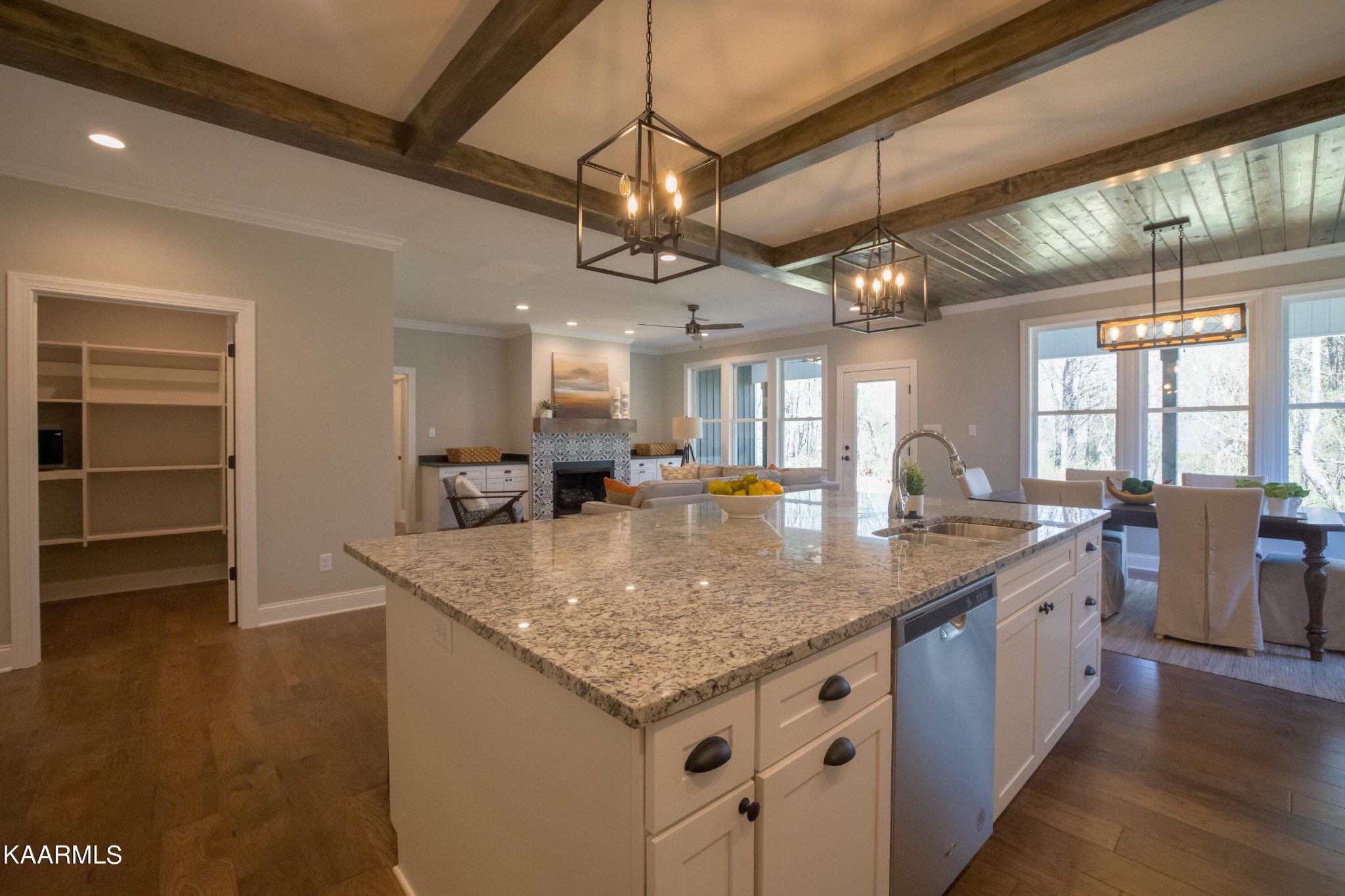 162 Tsuhdatsi Way Loudon, TN 37774 - Photo 8 of 38 a kitchen with stainless steel appliances granite countertop a kitchen island a stove and a sink