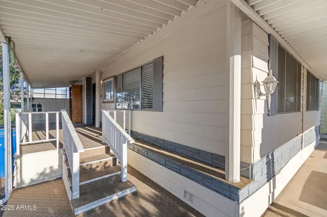a view of kitchen with furniture and wooden floor