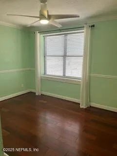 an empty room with a empty space and a window