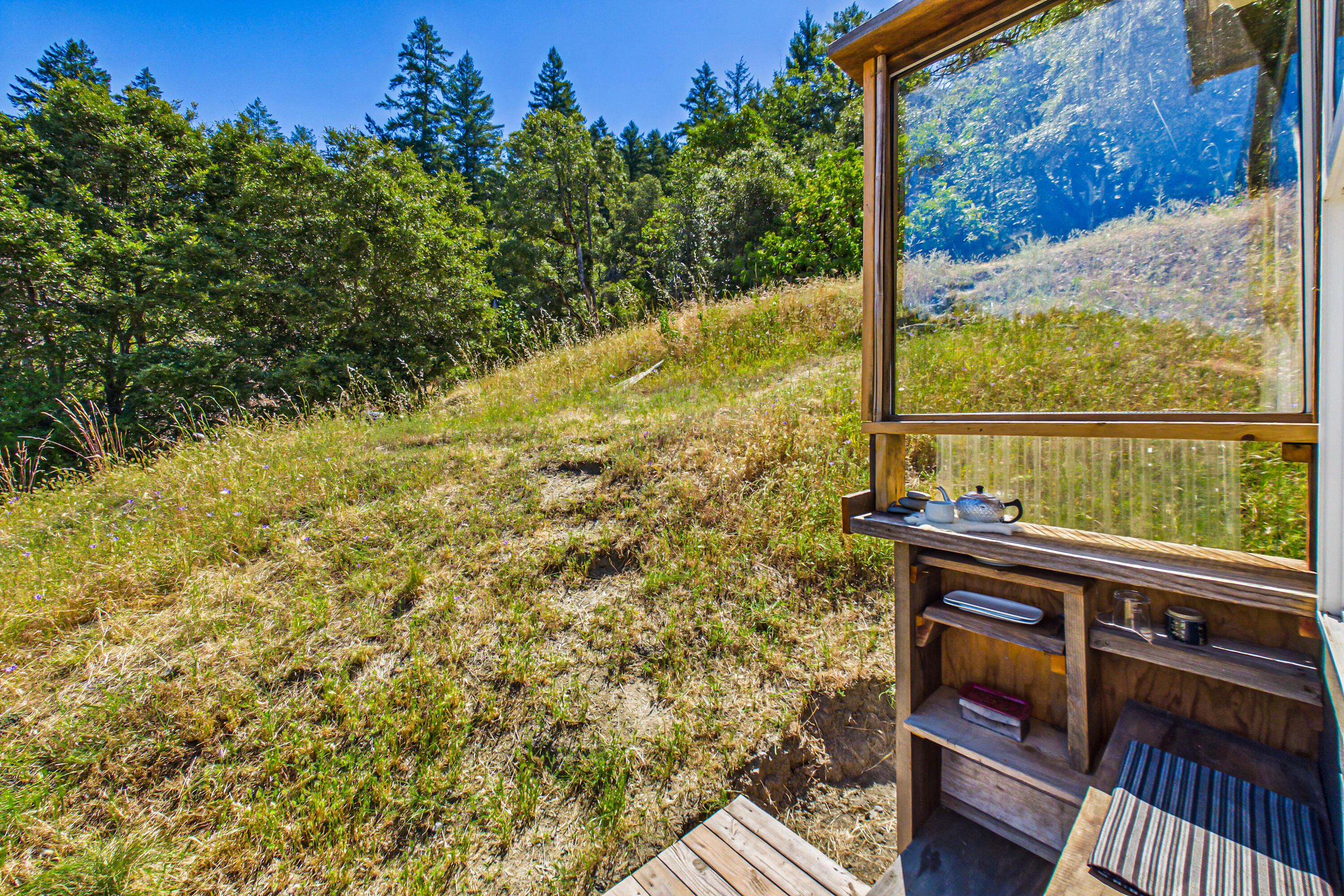 60890 Bell Springs Road Laytonville, CA 95454 - Photo 68 of 77 a view of a balcony with a bench