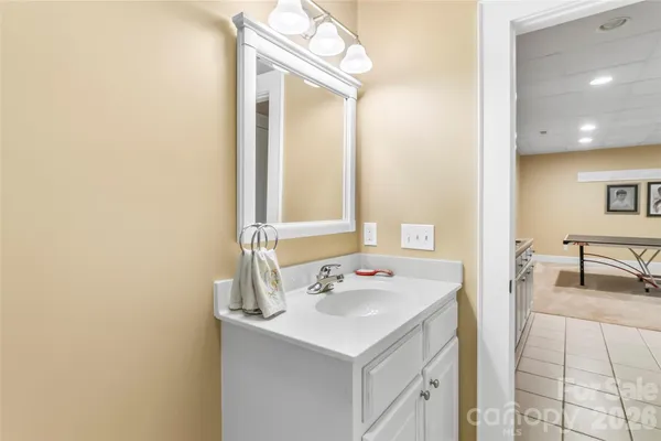 a view of bathroom with dual sinks
