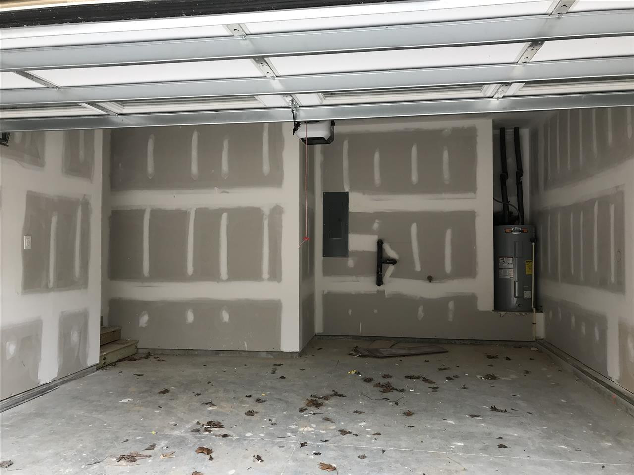 2528 Rambling Creek Road, Unit 22 Apex, NC 27523 - Photo 22 of 28 Garage with extra storage area in the back. Garage
