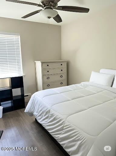 8 Diane Road Manahawkin, NJ 08050 - Photo 7 of 11 a bedroom with a bed and a chandelier