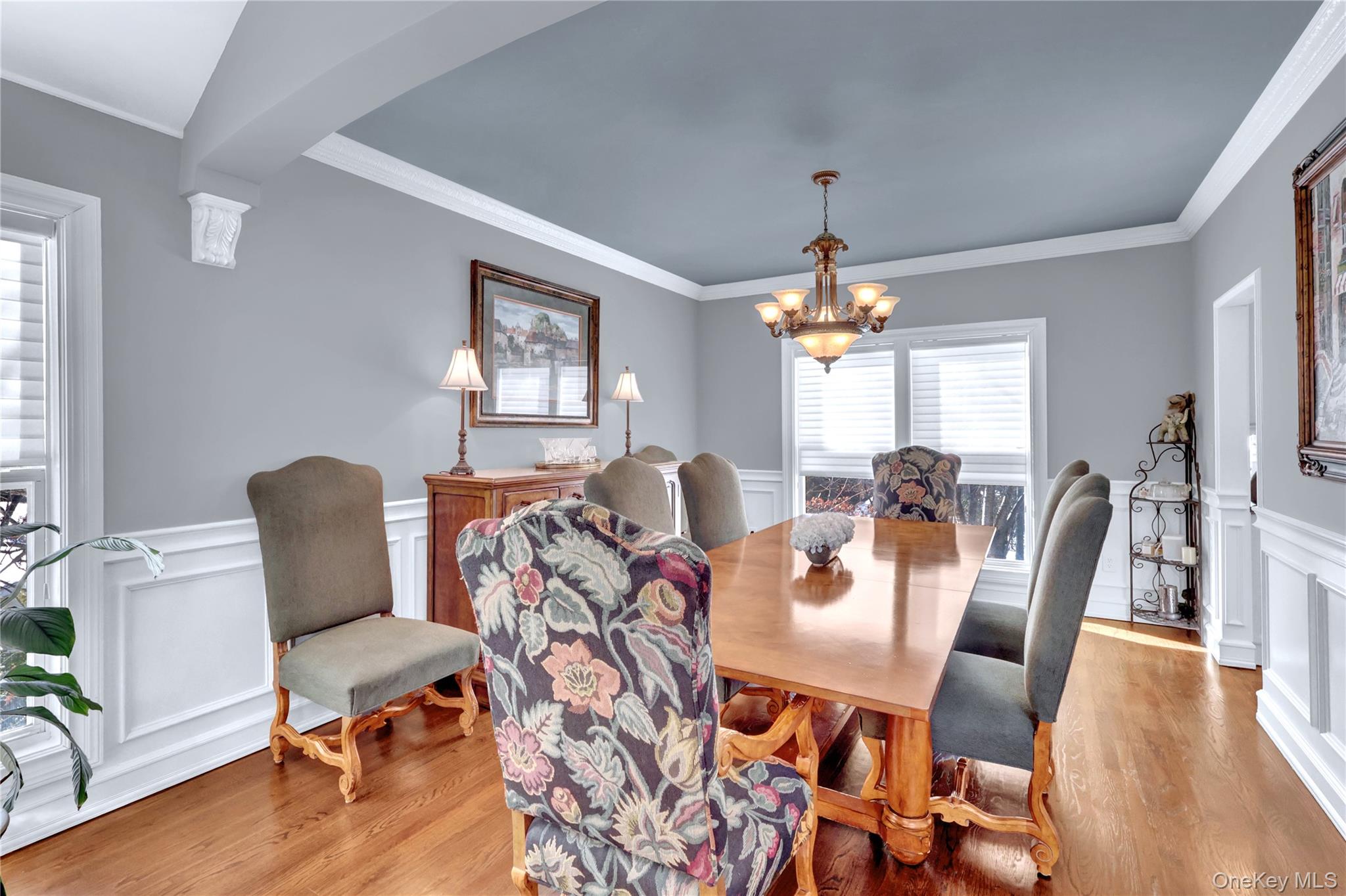 5 Frost Valley Road Mount Sinai, NY 11766 - Photo 12 of 49 a view of a dining room with furniture wooden floor and chandelier