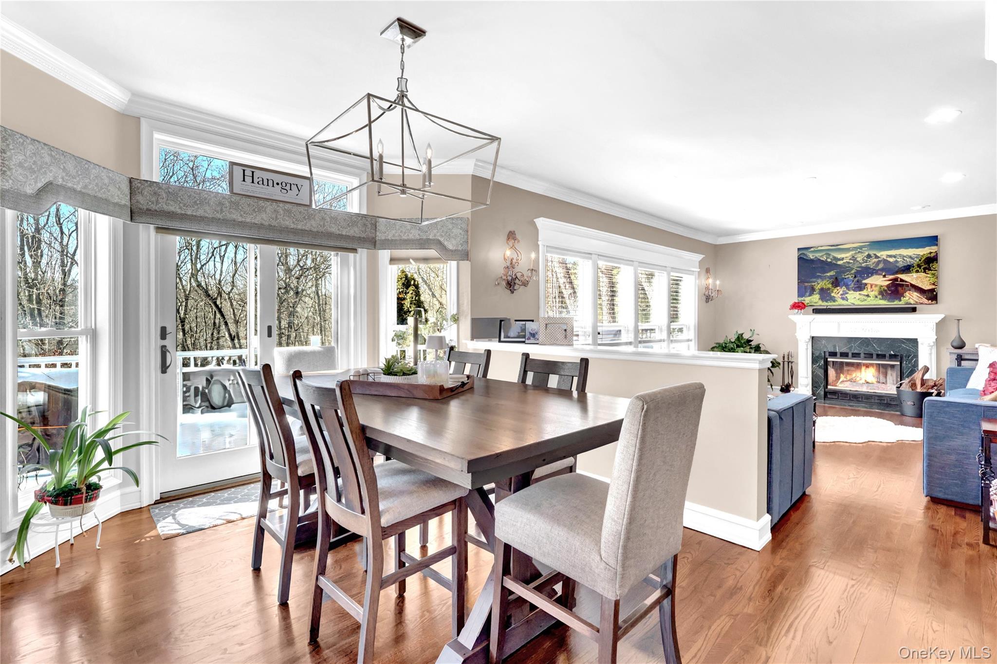 5 Frost Valley Road Mount Sinai, NY 11766 - Photo 16 of 49 a view of a dining room with furniture window and wooden floor