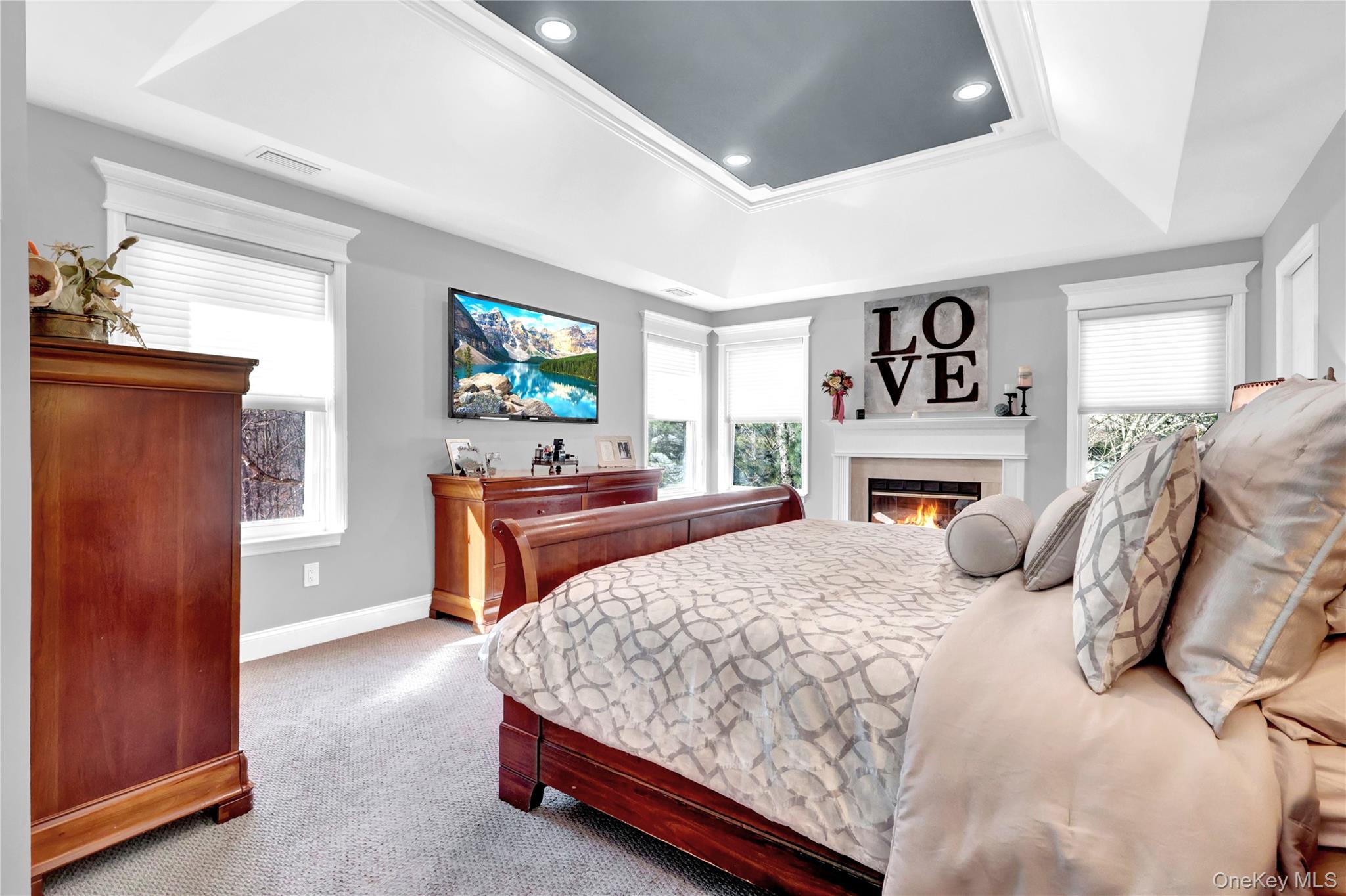 5 Frost Valley Road Mount Sinai, NY 11766 - Photo 23 of 49 a bedroom with a bed and furniture