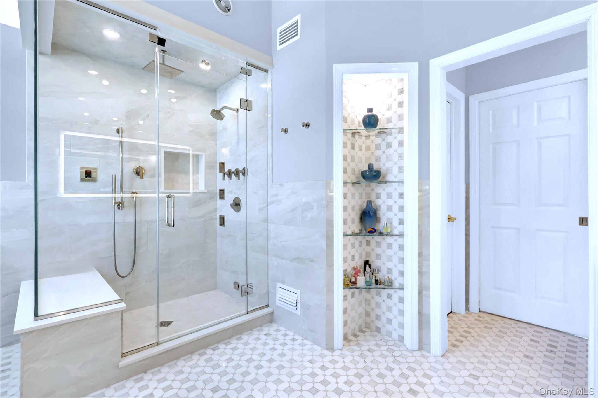 5 Frost Valley Road Mount Sinai, NY 11766 - Photo 26 of 49 a bathroom with a glass shower door