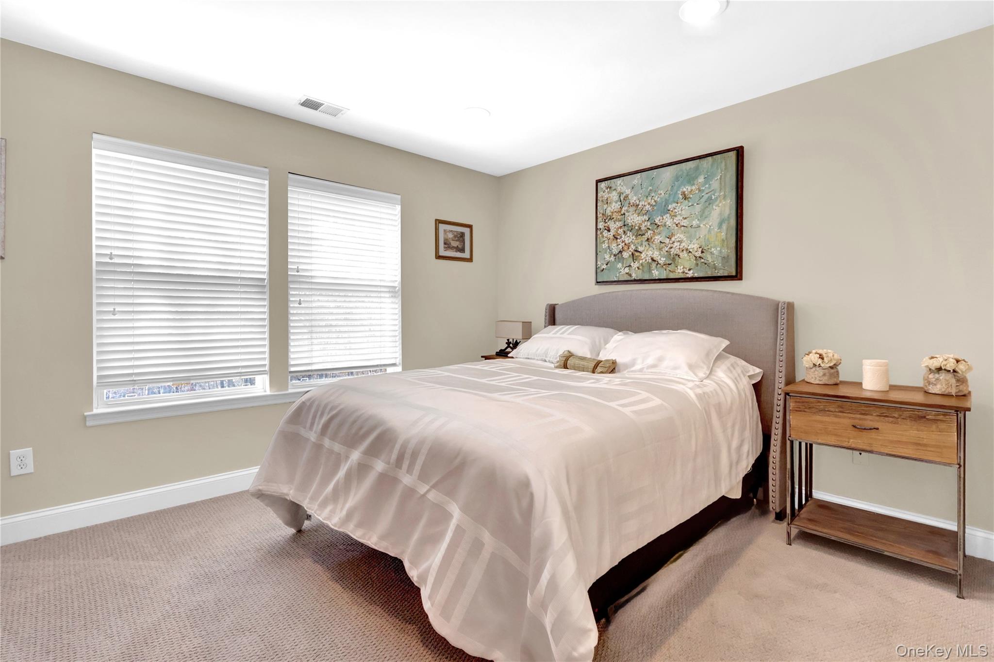 5 Frost Valley Road Mount Sinai, NY 11766 - Photo 29 of 49 a bedroom with a bed and a window