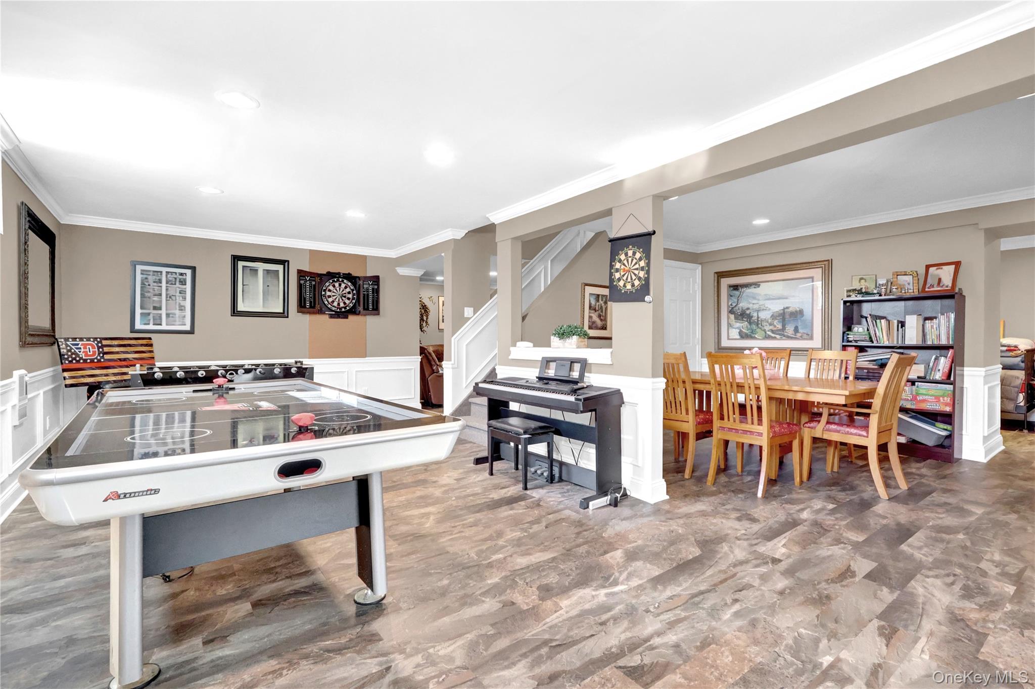 5 Frost Valley Road Mount Sinai, NY 11766 - Photo 33 of 49 a living room with chairs and a table