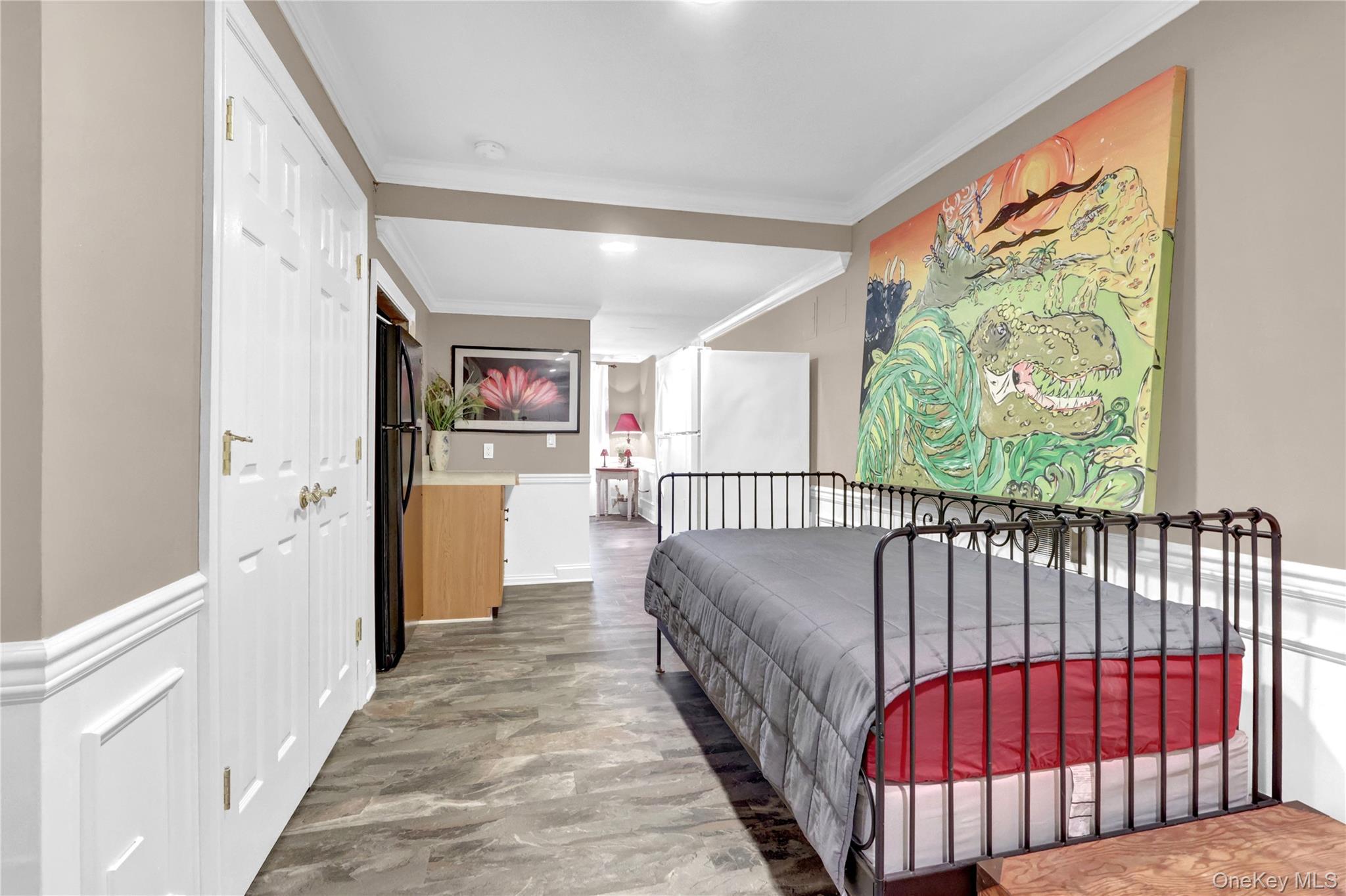 5 Frost Valley Road Mount Sinai, NY 11766 - Photo 35 of 49 a view of a hallway with wooden floor and stairs