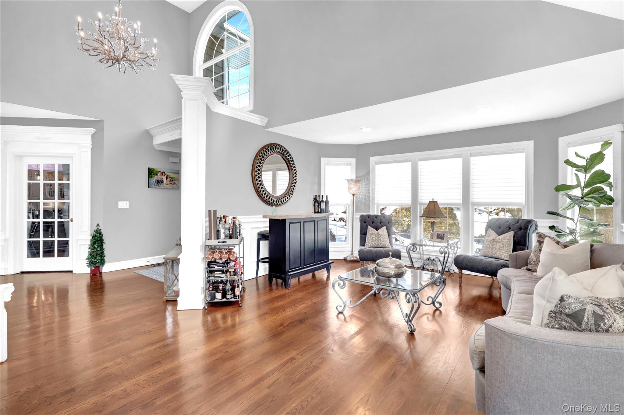 5 Frost Valley Road Mount Sinai, NY 11766 - Photo 9 of 49 a living room with fireplace furniture and a large window