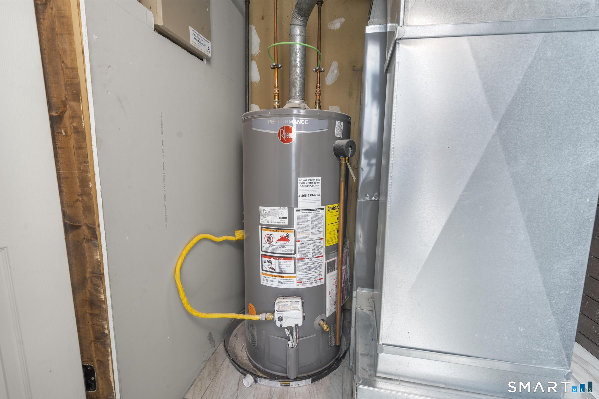 7 Pettit Drive Meriden, CT 06451 - Photo 34 of 35 a bathroom with a sink and mirror