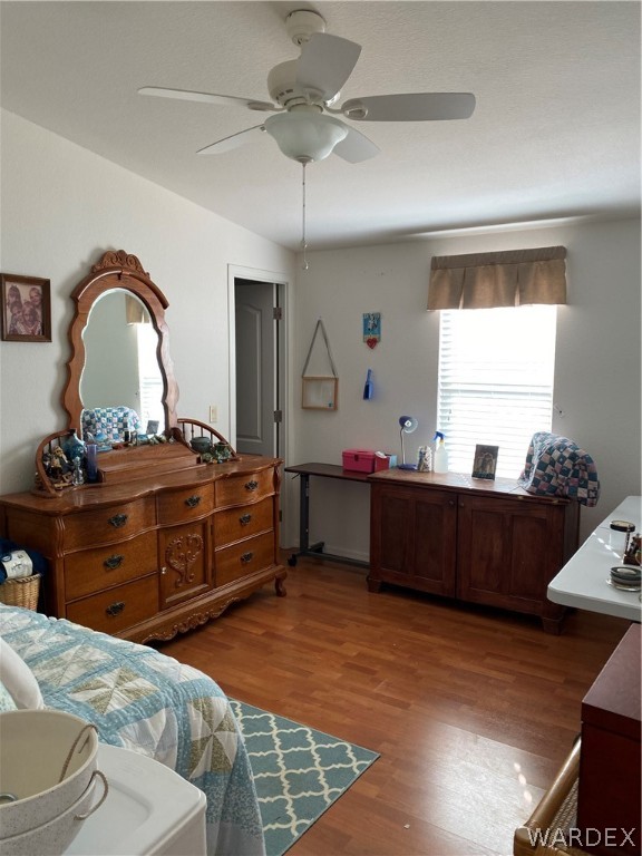 13411 South Water Reed Way Topock, AZ 86436 - Photo 14 of 18 a bedroom with a bed and a dresser