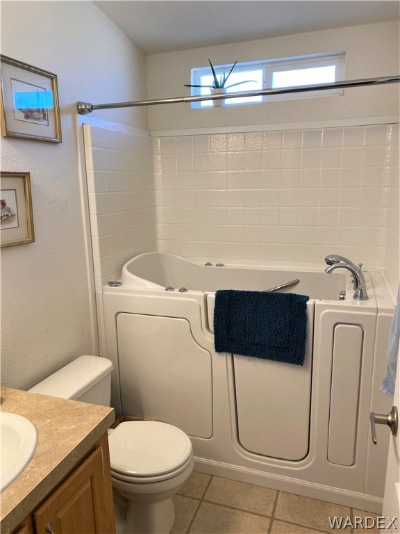 13411 South Water Reed Way Topock, AZ 86436 - Photo 15 of 18 a bathroom with a toilet and a sink
