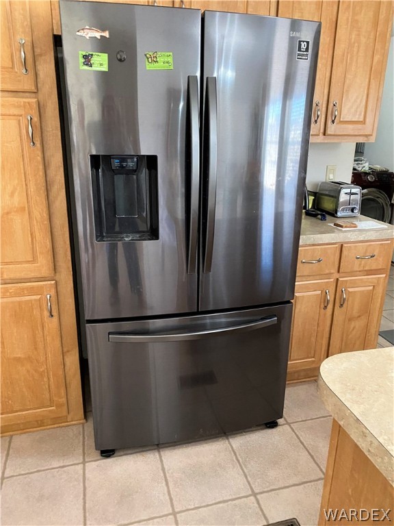 13411 South Water Reed Way Topock, AZ 86436 - Photo 8 of 18 a metallic refrigerator freezer sitting in a kitchen