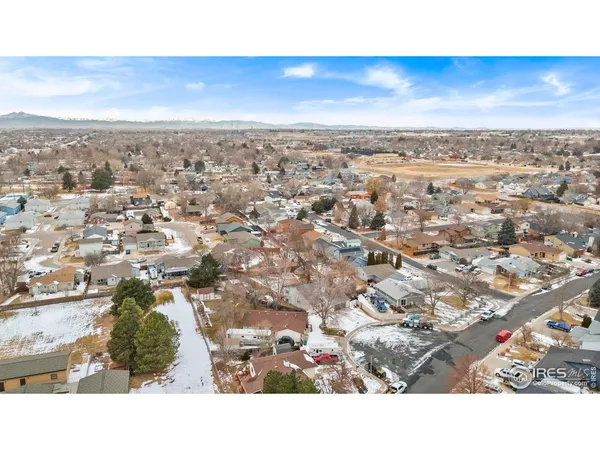 an aerial view of residential building and ocean