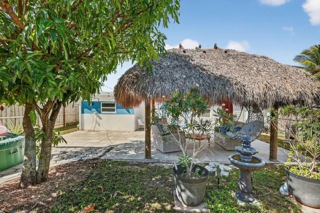 a view of backyard with tree