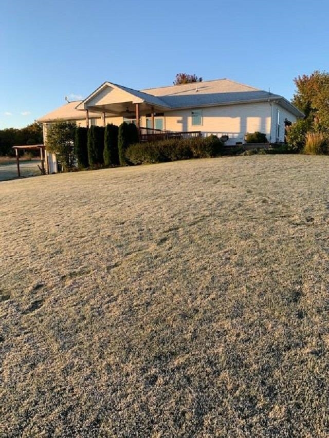 1869 East Town Line Road Oregon, IL 61061 - Photo 2 of 45 a front view of a house with a yard