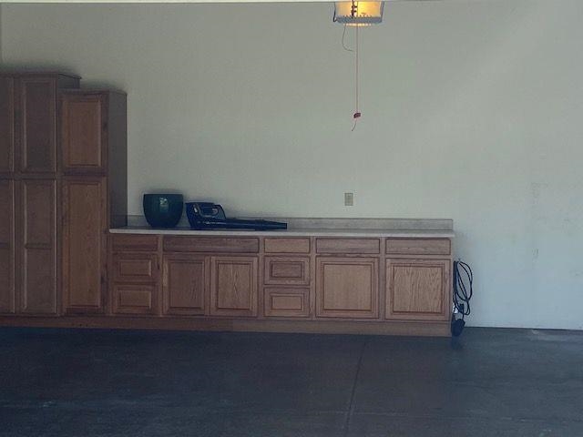 1869 East Town Line Road Oregon, IL 61061 - Photo 27 of 45 a kitchen with cabinets and window