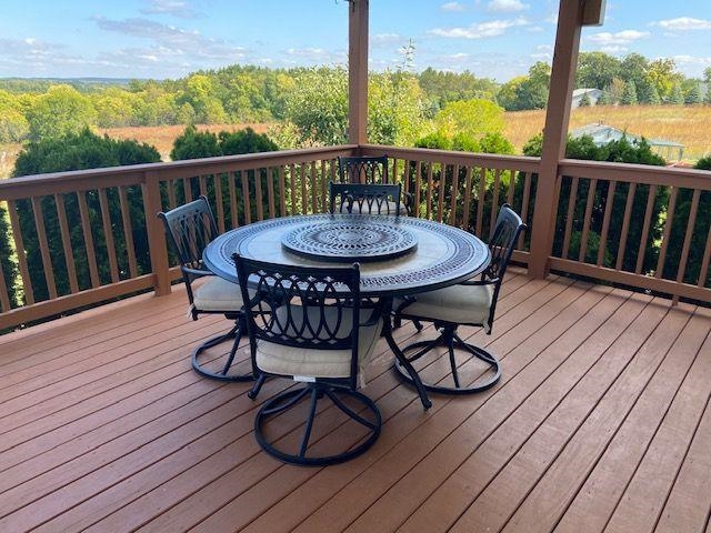 1869 East Town Line Road Oregon, IL 61061 - Photo 31 of 45 a view of a chairs on wooden deck