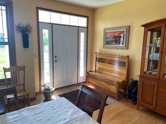 1869 East Town Line Road Oregon, IL 61061 - Photo 8 of 45 a view of a livingroom with furniture and a window