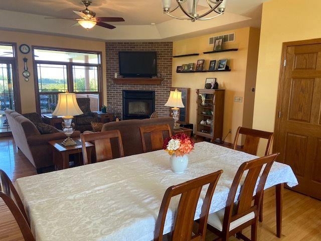 1869 East Town Line Road Oregon, IL 61061 - Photo 10 of 45 a view of a dining room with furniture