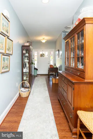 a large hall with stainless steel appliances granite countertop lots of counter top space