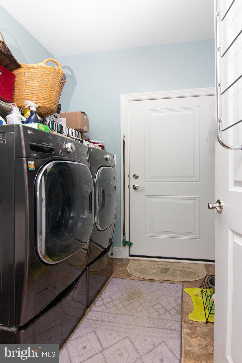 2785 Castlefield Drive, Unit 14 Manchester, MD 21102 - Photo 24 of 42 a utility room with dryer and washer