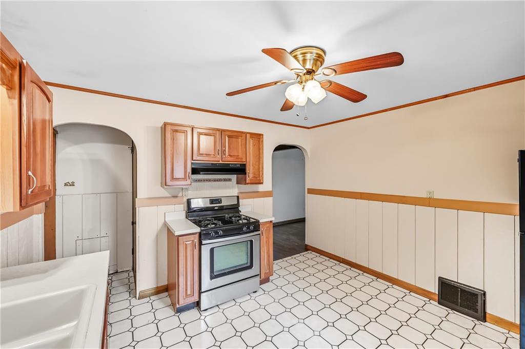 66 Concord Road Hermitage, PA 16148 - Photo 12 of 21 a kitchen with stainless steel appliances a refrigerator and a stove top oven