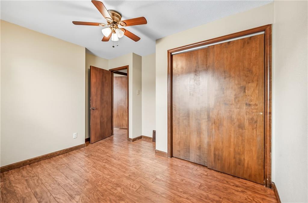 66 Concord Road Hermitage, PA 16148 - Photo 16 of 21 a view of a big room with closet and a chandelier fan