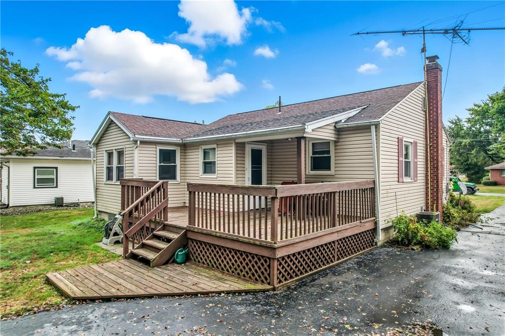 66 Concord Road Hermitage, PA 16148 - Photo 3 of 21 a view of backyard with a garden and deck