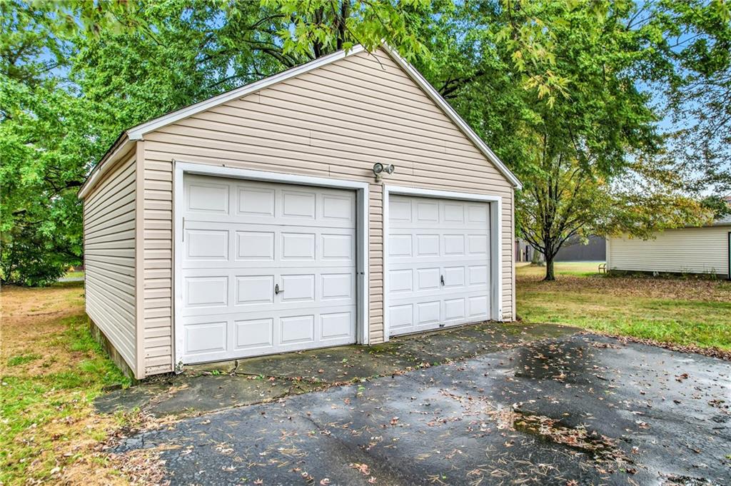 66 Concord Road Hermitage, PA 16148 - Photo 6 of 21 a view of a house with a space and garage
