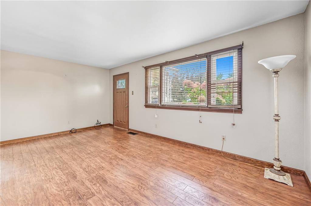 66 Concord Road Hermitage, PA 16148 - Photo 9 of 21 a view of an empty room with a window