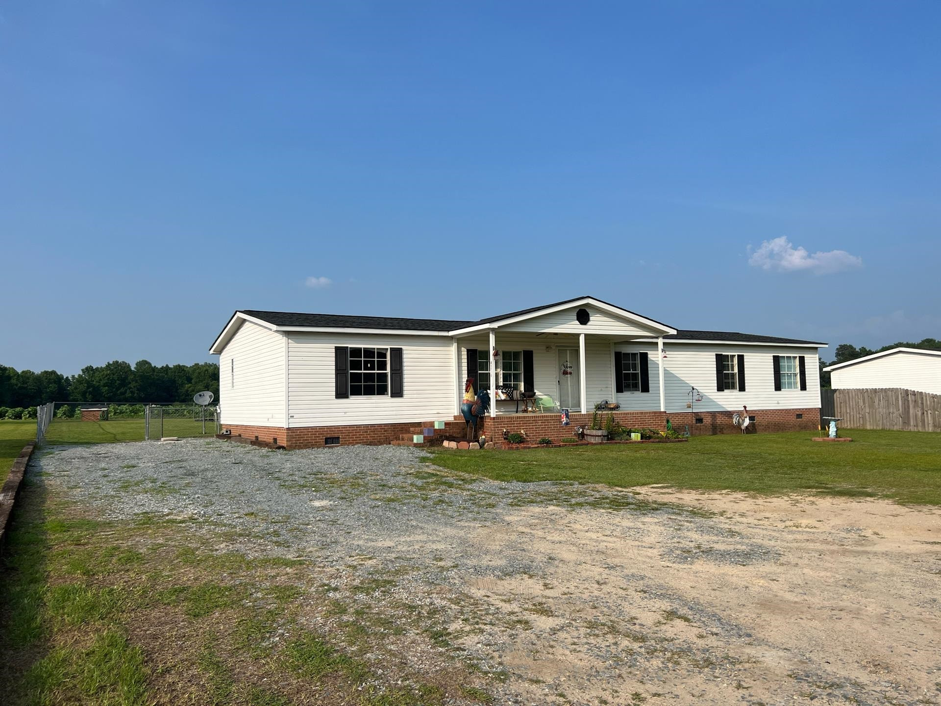 4516 North Spring Branch Road Dunn, NC 28334 - Photo 1 of 21 Doublewide is FHA ready. Front porch and rear porch and above ground pool. Exterior Front