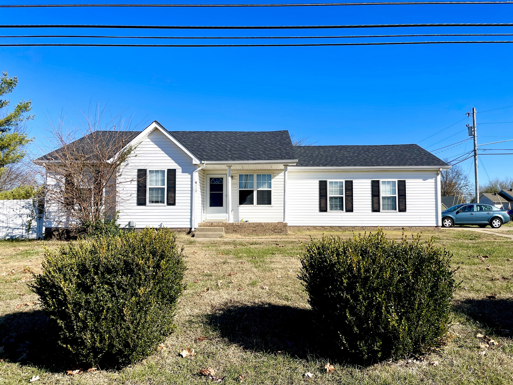 710 Hugh Hunter Road Oak Grove, KY 42262 - Photo 1 of 12 a front view of a house with a yard