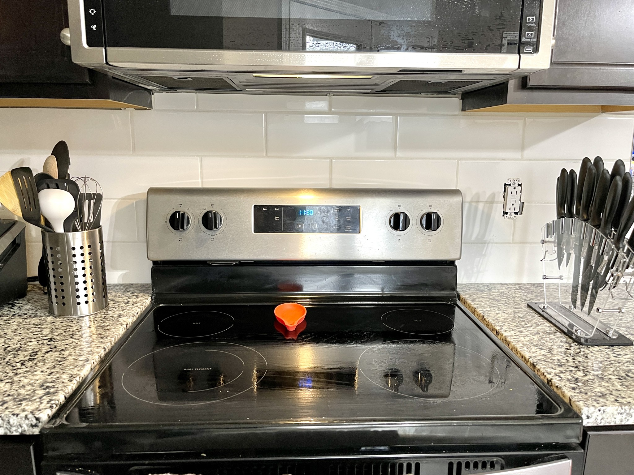 710 Hugh Hunter Road Oak Grove, KY 42262 - Photo 12 of 12 a stove top oven sitting inside of a kitchen