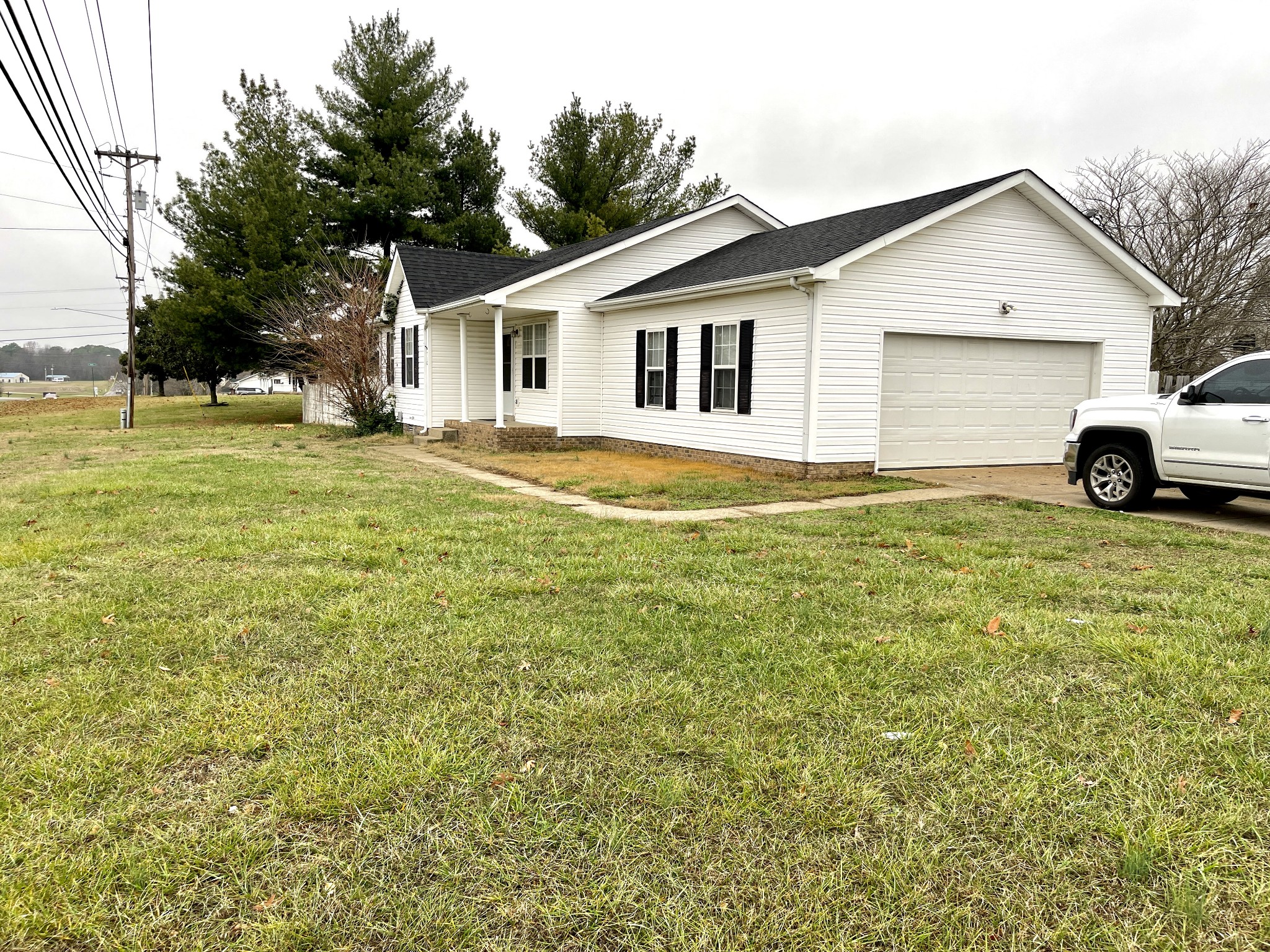710 Hugh Hunter Road Oak Grove, KY 42262 - Photo 2 of 12 a view of a house with a yard