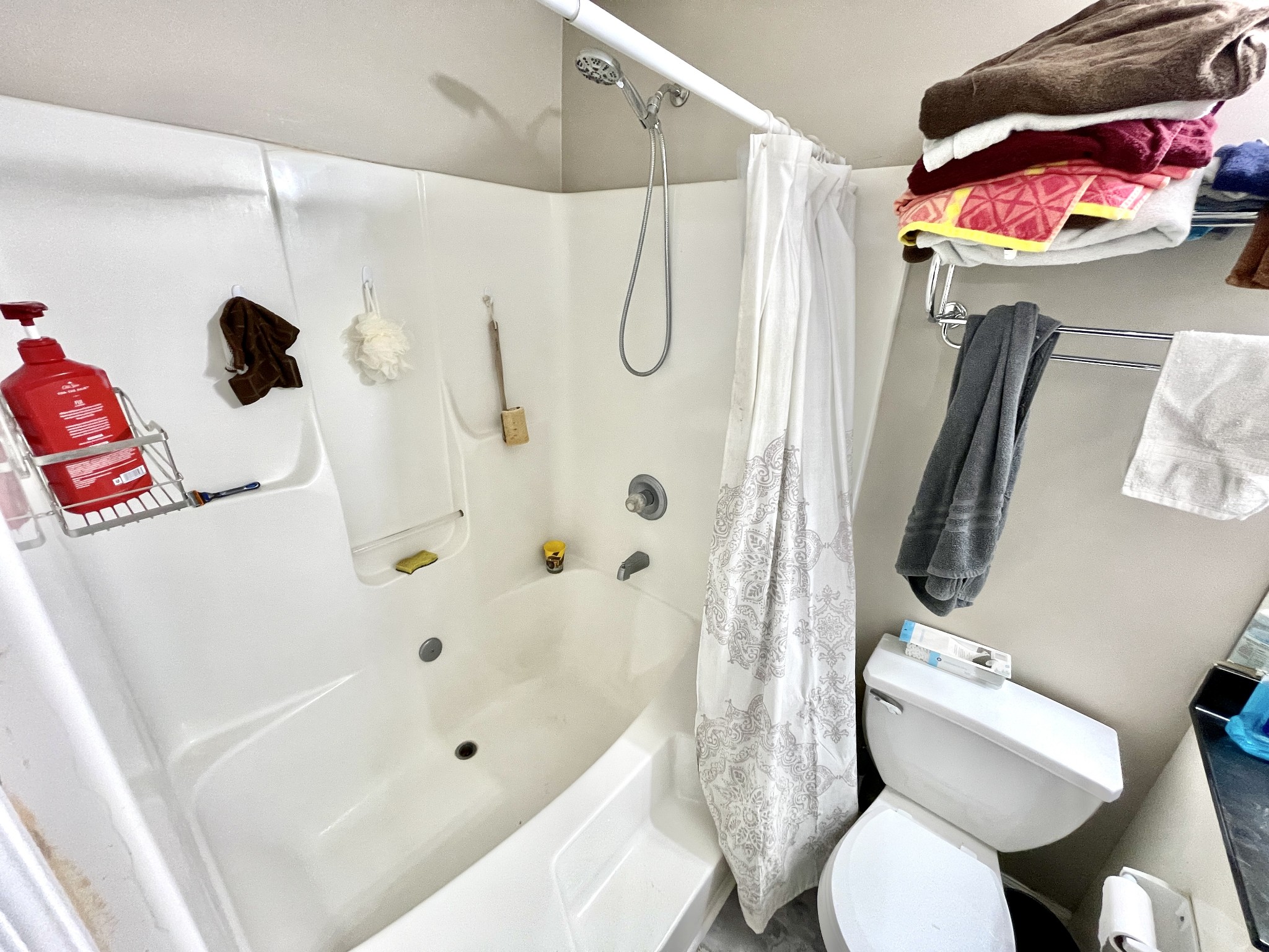710 Hugh Hunter Road Oak Grove, KY 42262 - Photo 8 of 12 a bathroom with a toilet and a shower