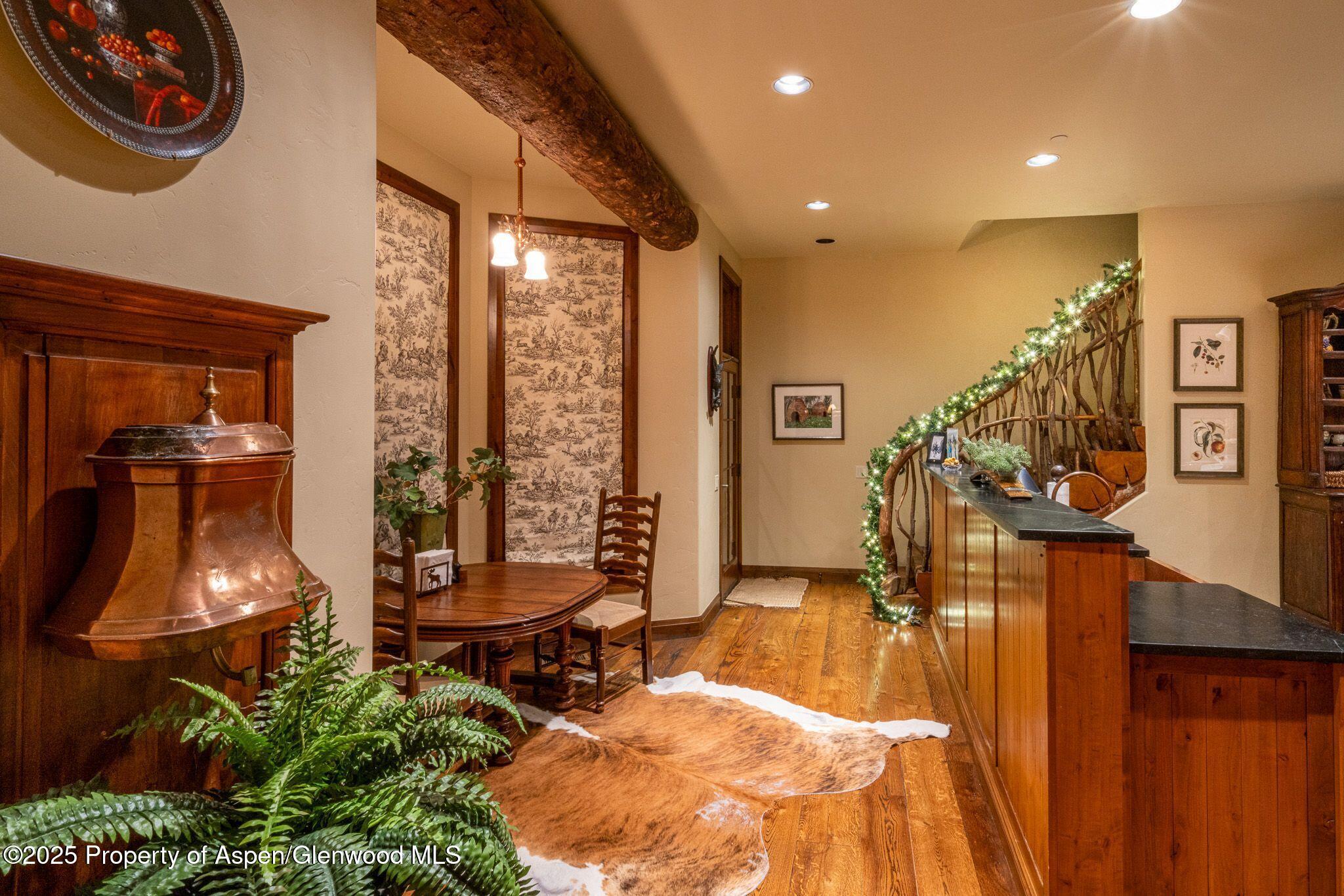 800 South Hayden Road Aspen, CO 81611 - Photo 26 of 57 Xmas Breakfast area off Kitchen to Upsst