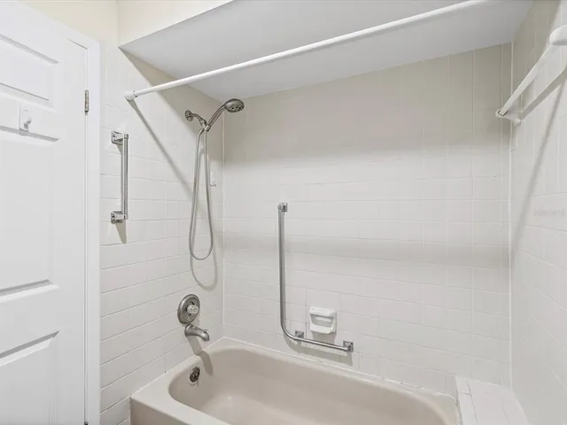 a bathroom with a sink and a shower