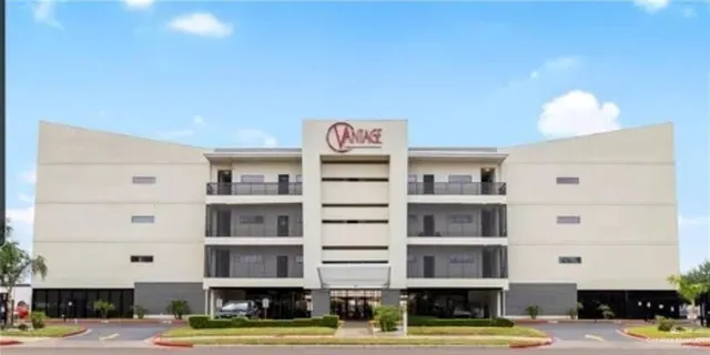 a front view of a building with street