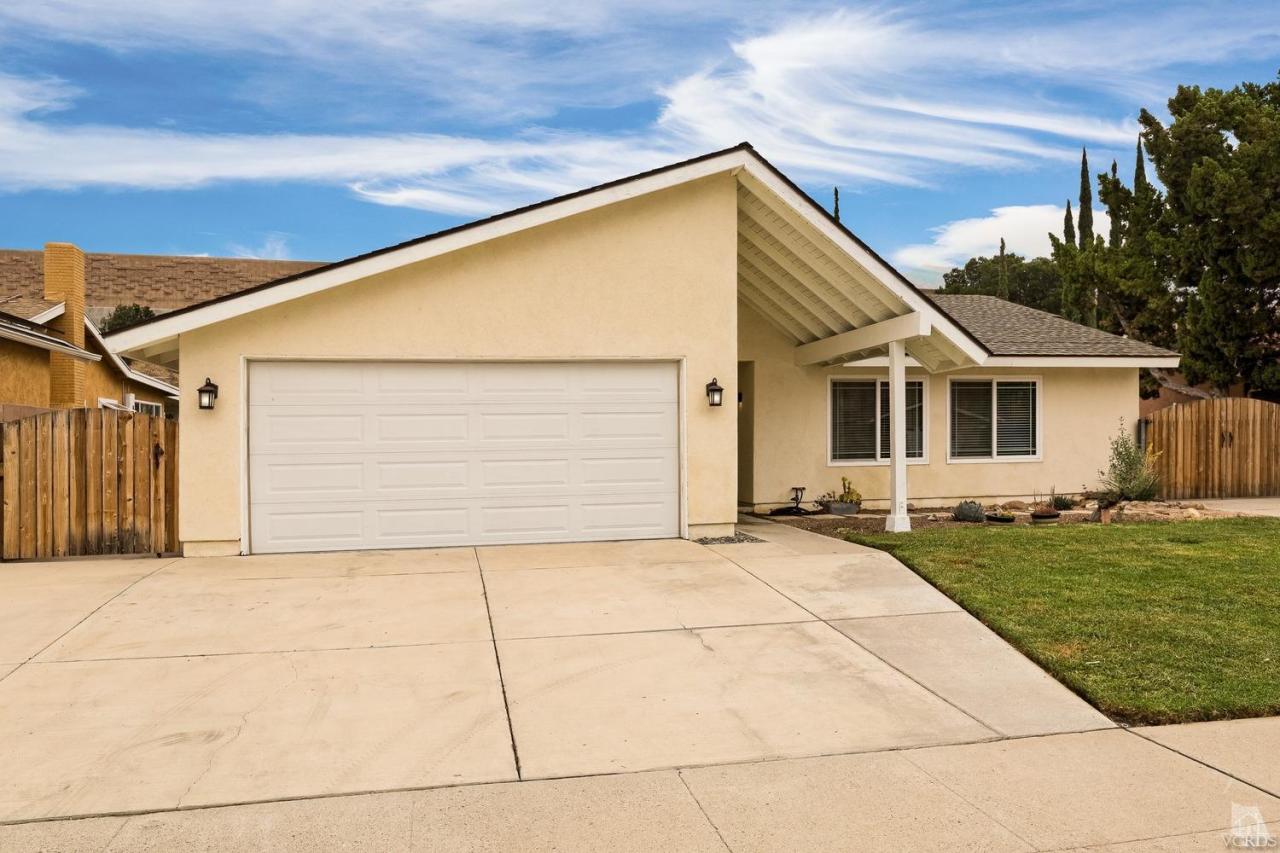 6449 Keystone Street Simi Valley, CA 93063 - Photo 2 of 20 a view of a house with a backyard