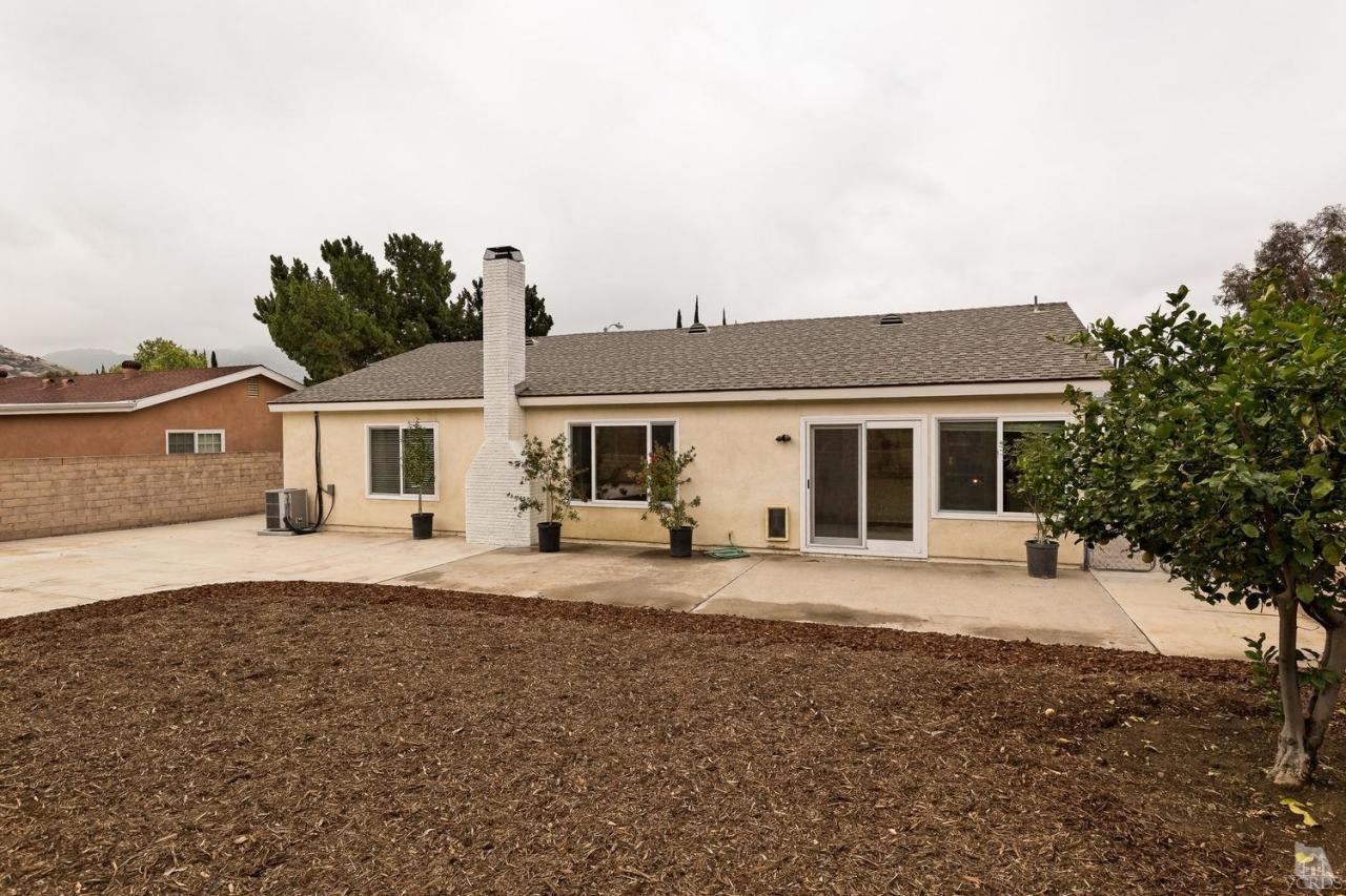 6449 Keystone Street Simi Valley, CA 93063 - Photo 16 of 20 a front view of a house with a garden
