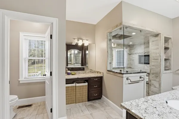 a kitchen with a sink stove and refrigerator