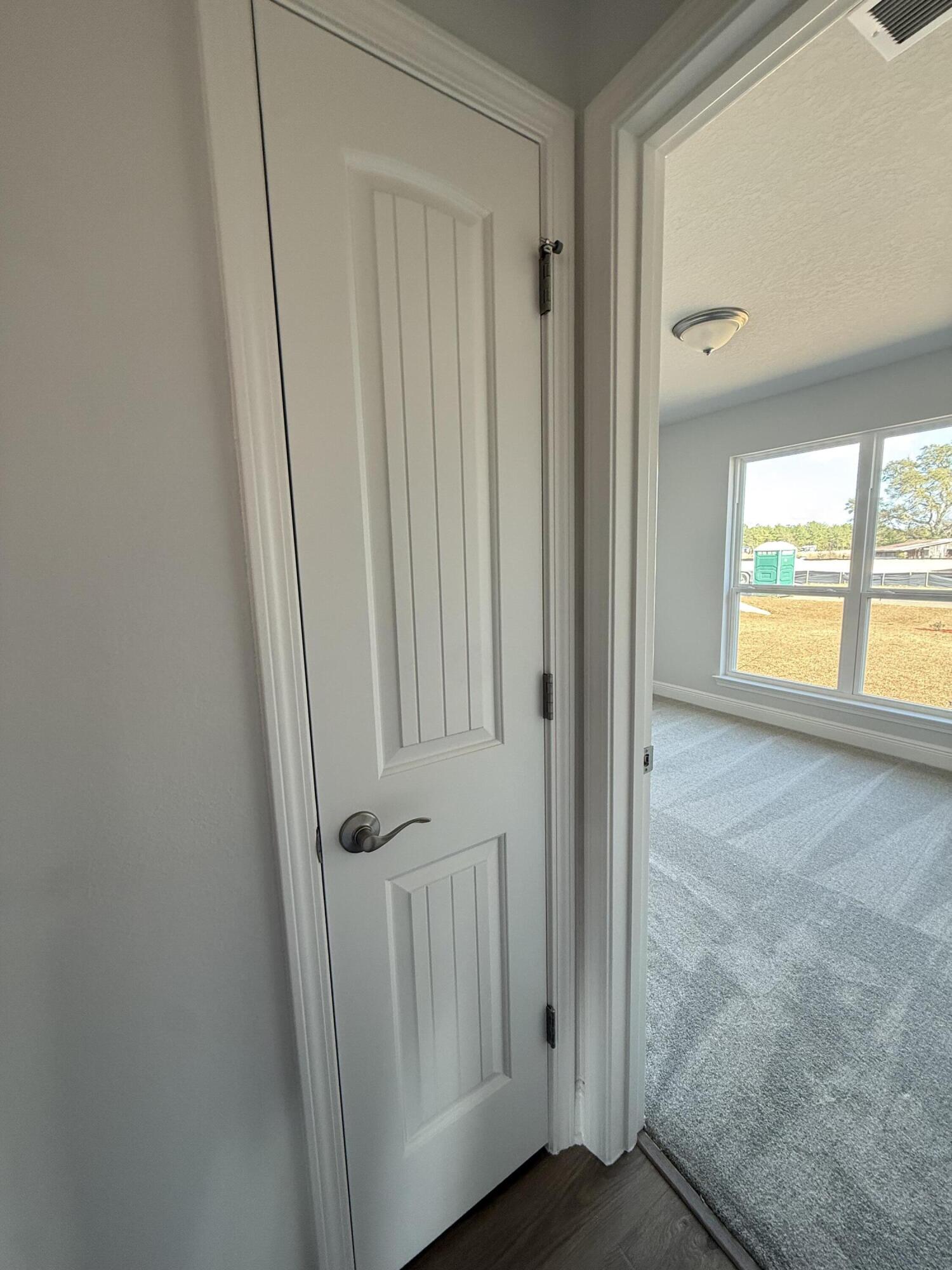 6013 Crocket Cove Crestview, FL 32539 - Photo 11 of 27 wooden floor in a gallery