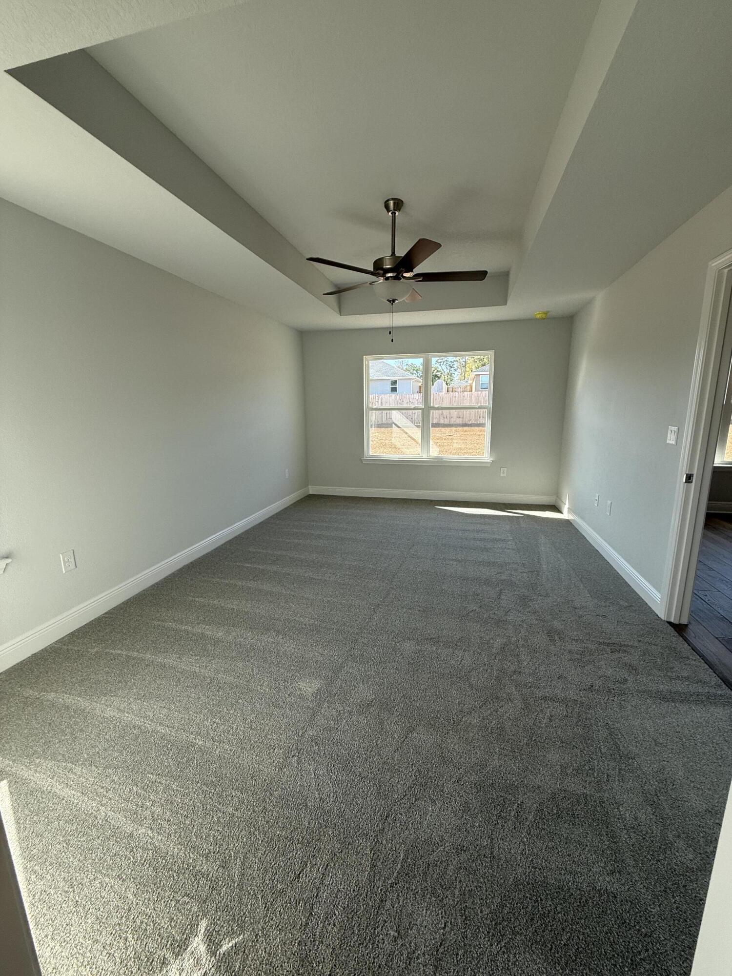6013 Crocket Cove Crestview, FL 32539 - Photo 19 of 27 a view of an empty room and window