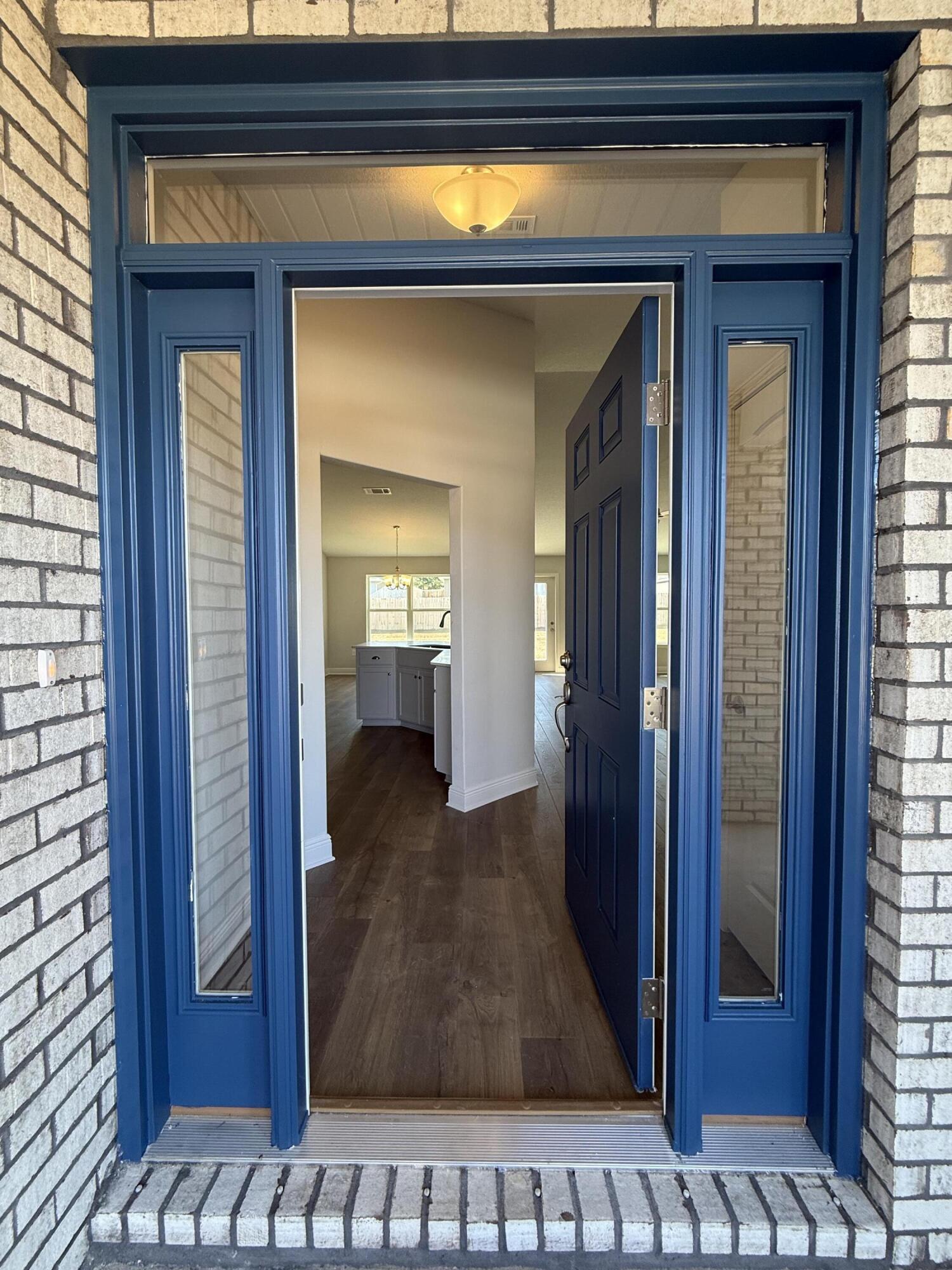 6013 Crocket Cove Crestview, FL 32539 - Photo 4 of 27 a view of a wooden door